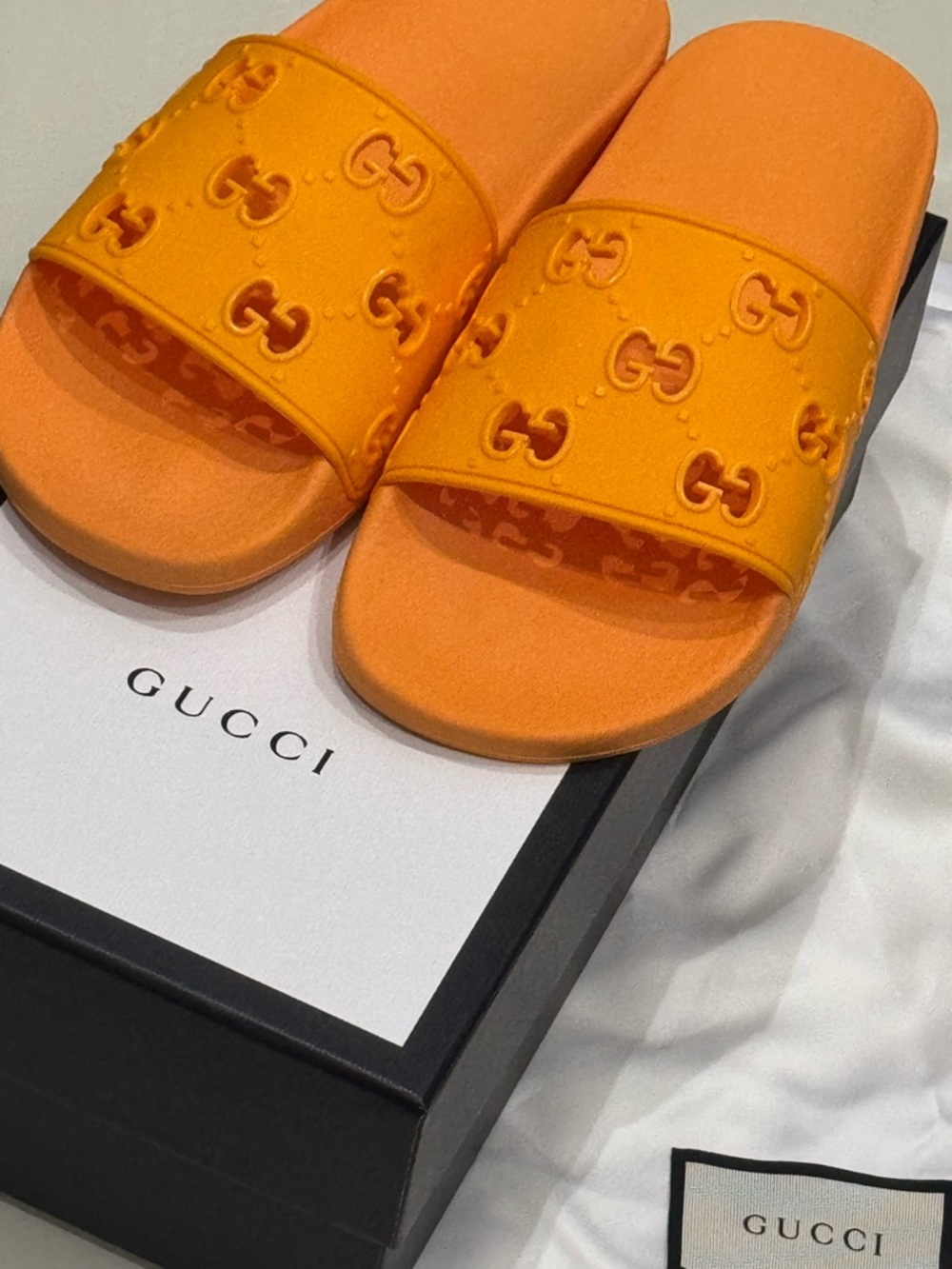 Gucci Orange Embossed GG Slide Sandals